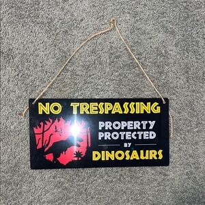 Black and Red Dinosaur No Trespassing Sign